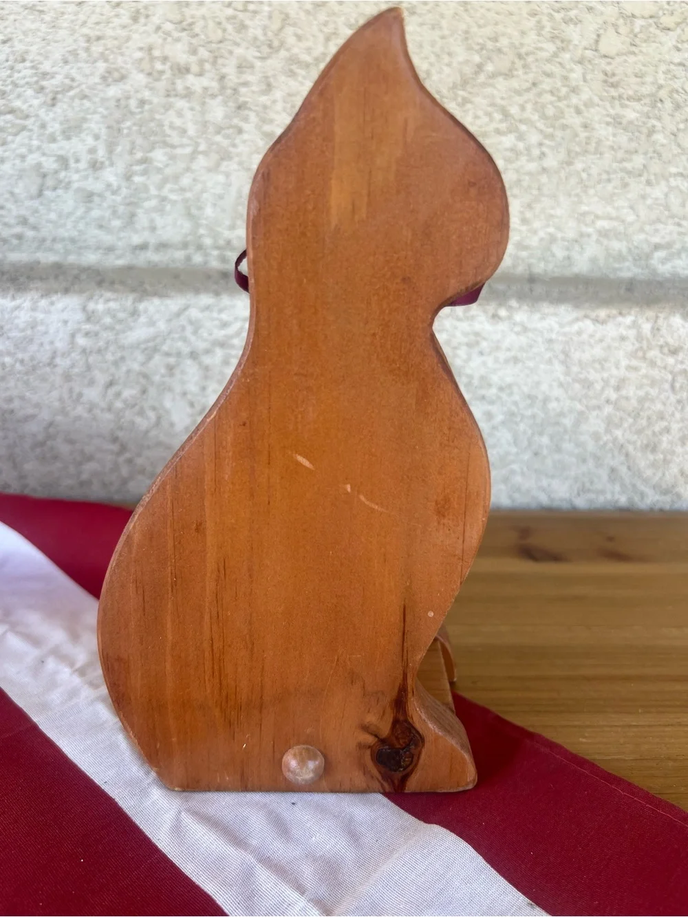 Wooden Cat Figurine with Burgundy Ribbon